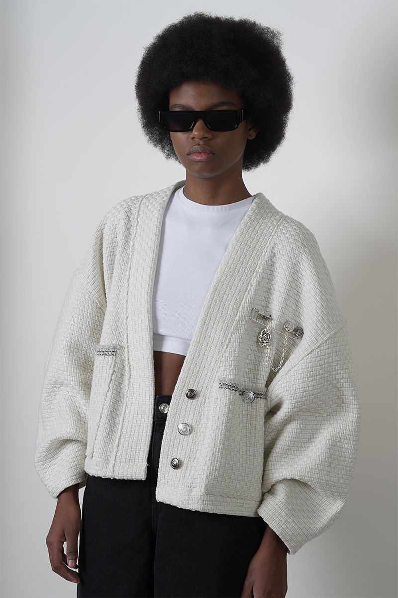 Cardigan detalle broche