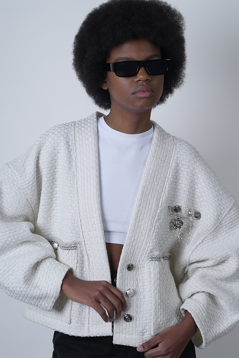 Cardigan detalle broche